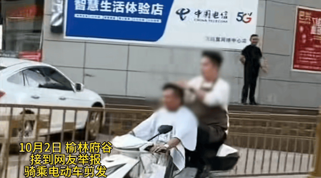 陕西一男子骑电动车时不停理发<strong></p>
<p>eth地址</strong>，被罚款500元、驾驶证记9分；民警呼吁公众注意电动车出行安全